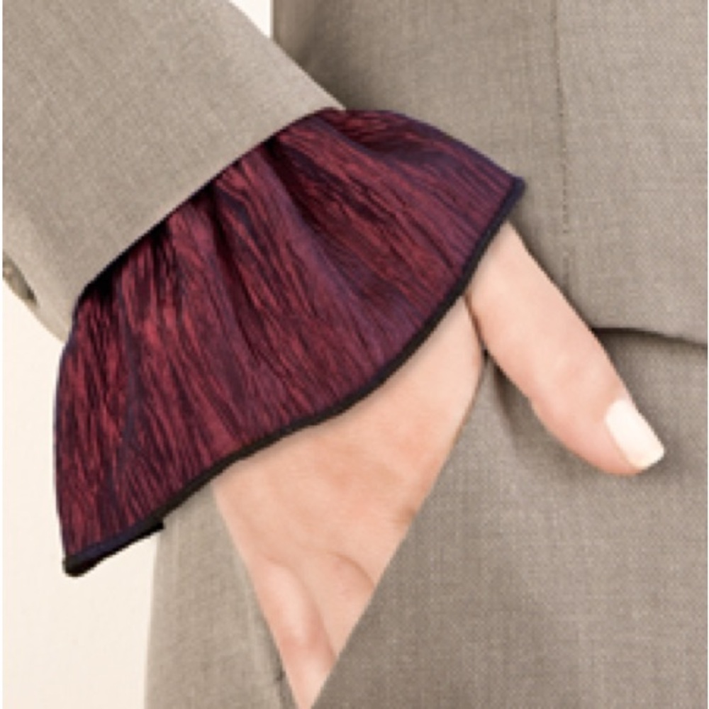 Slip on cuff accessory to embellishes boring tops.